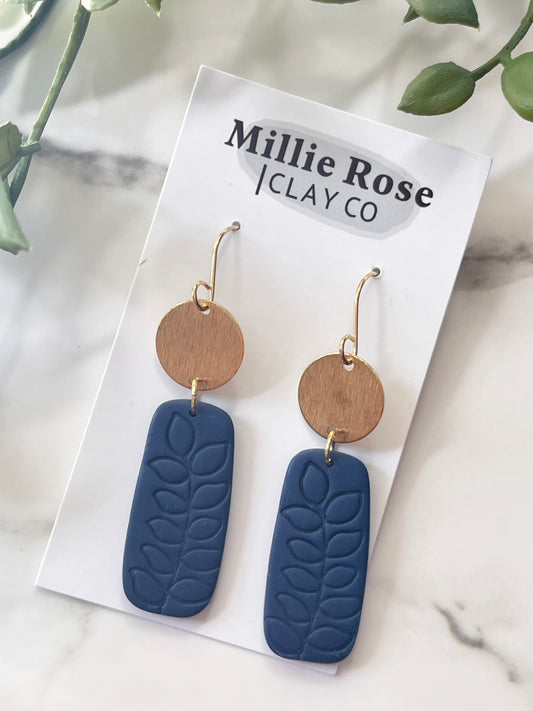 The Elke Navy Leaf imprint (Gold)