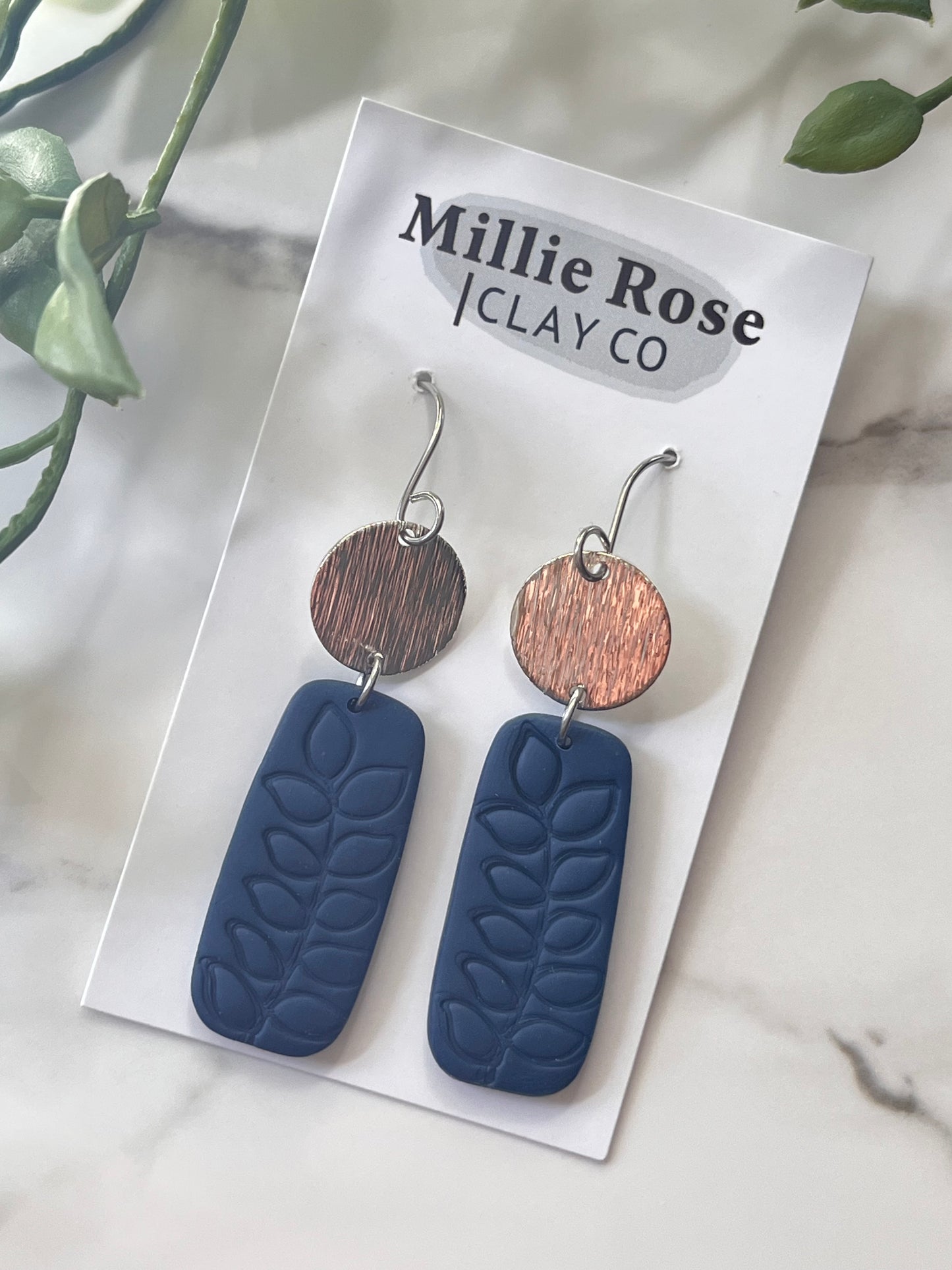 The Elke Navy Leaf imprint (Silver)